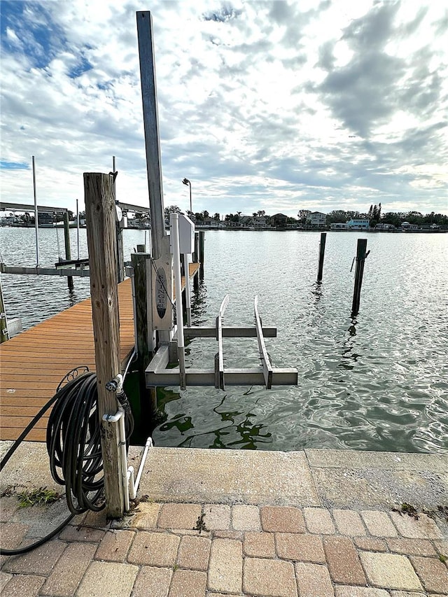 dock area featuring a water view