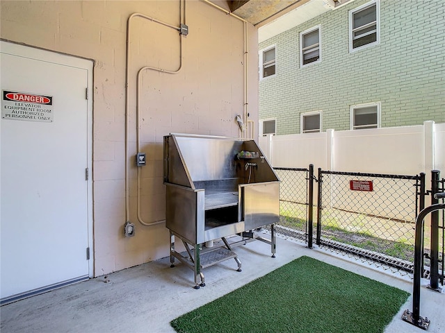 miscellaneous room with concrete flooring