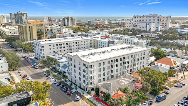 birds eye view of property featuring a city view