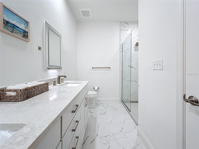 bathroom featuring a marble finish shower, visible vents, toilet, marble finish floor, and a sink