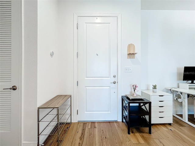 foyer with light wood-style flooring