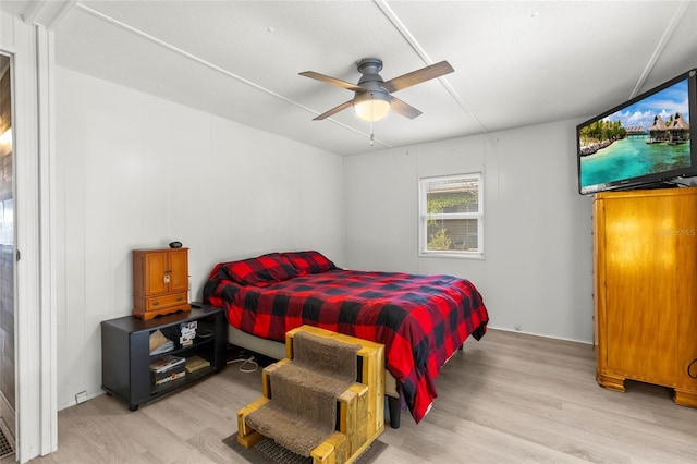 bedroom featuring ceiling fan and light hardwood / wood-style floors