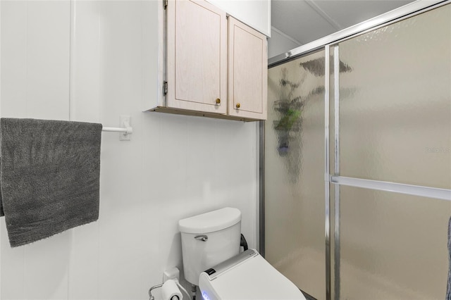 bathroom with toilet and walk in shower