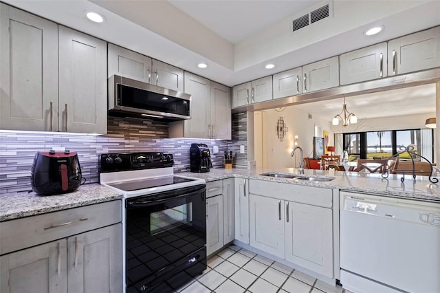 kitchen featuring sink, an inviting chandelier, dishwasher, black electric range oven, and backsplash