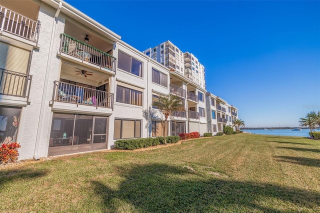 view of building exterior featuring a water view