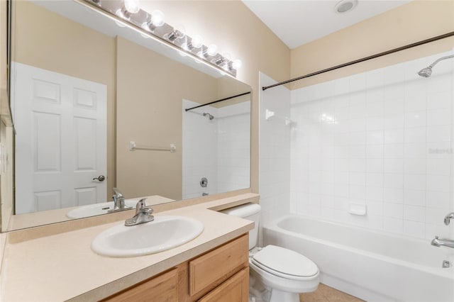 full bathroom with tile patterned floors, shower / bathing tub combination, vanity, and toilet