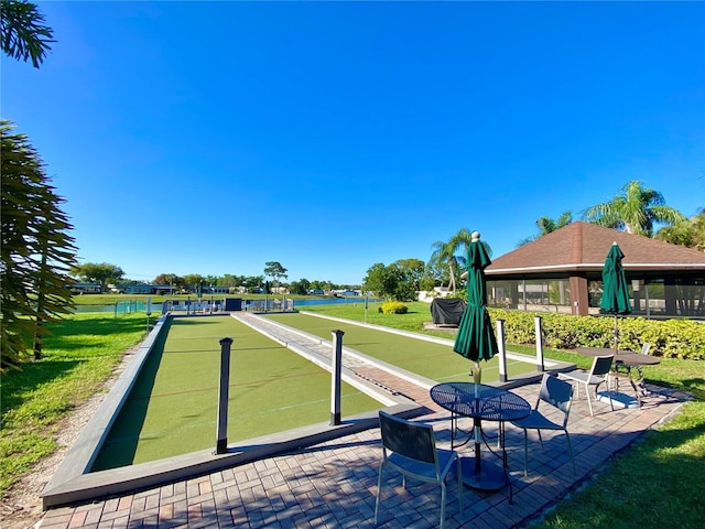 view of home's community featuring a lawn