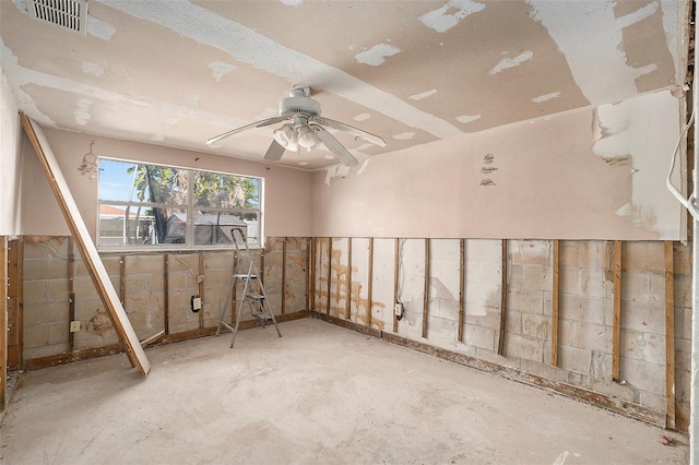 basement featuring ceiling fan