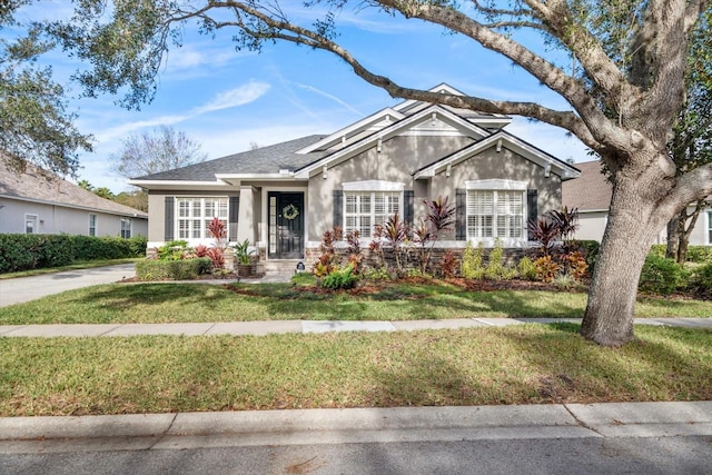 view of front of home with a front yard