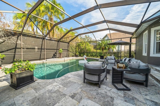 view of swimming pool featuring glass enclosure, an outdoor living space, and a patio