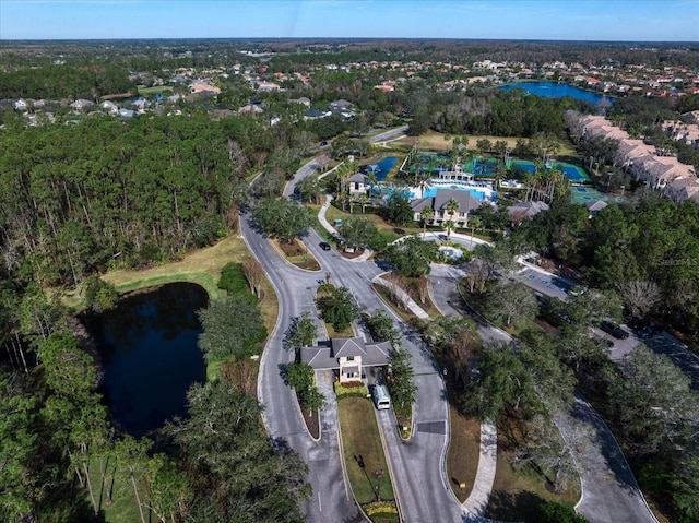 bird's eye view with a water view