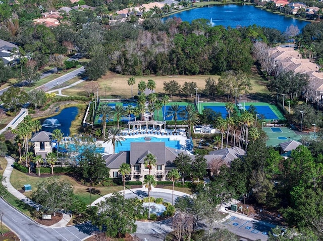 birds eye view of property with a water view