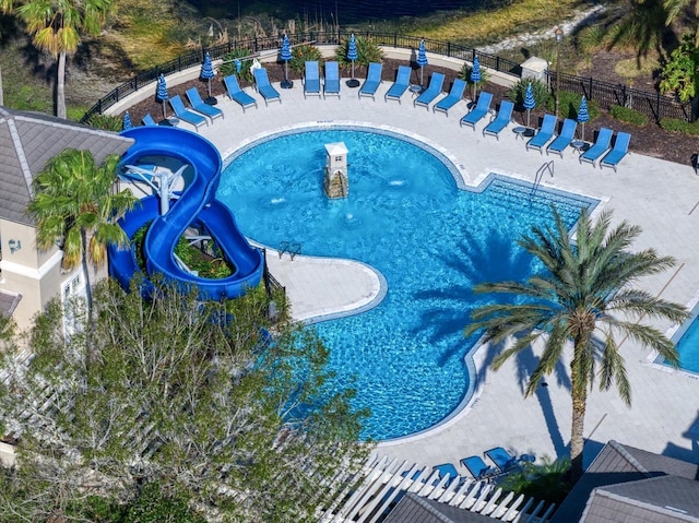 view of pool featuring a water slide