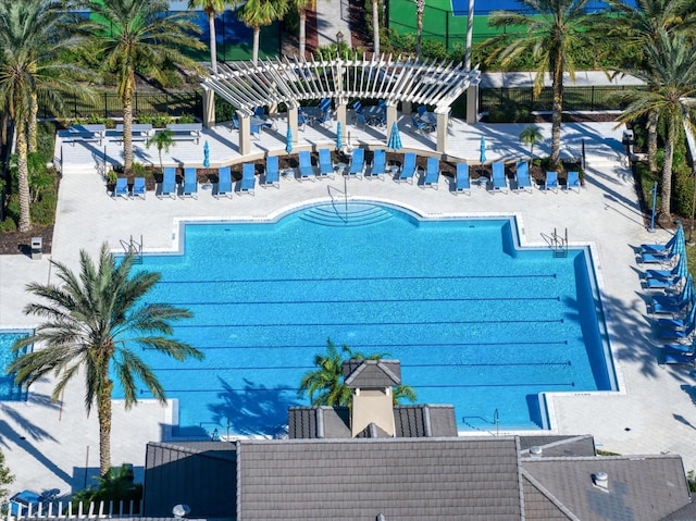 view of pool with a pergola and a patio