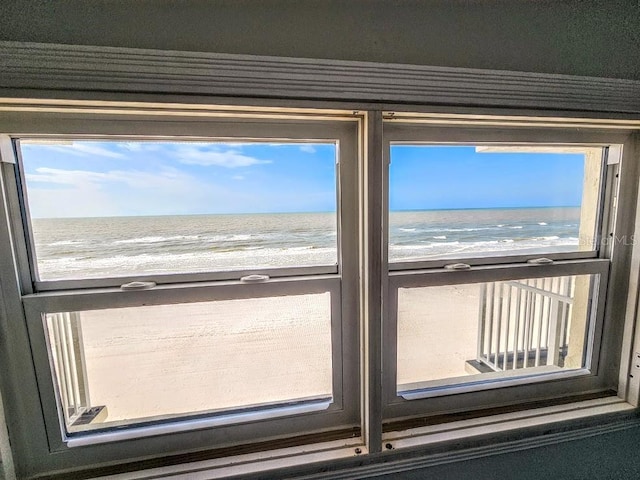 details with a water view and a view of the beach