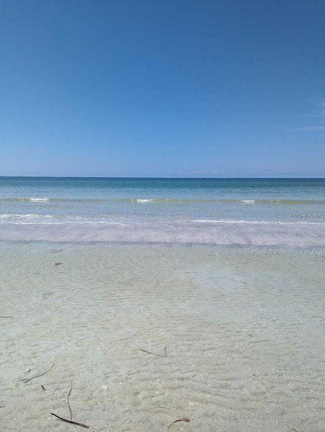 view of water feature with a beach view