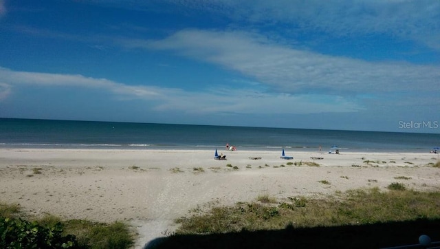 property view of water featuring a beach view