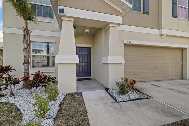 property entrance featuring a garage