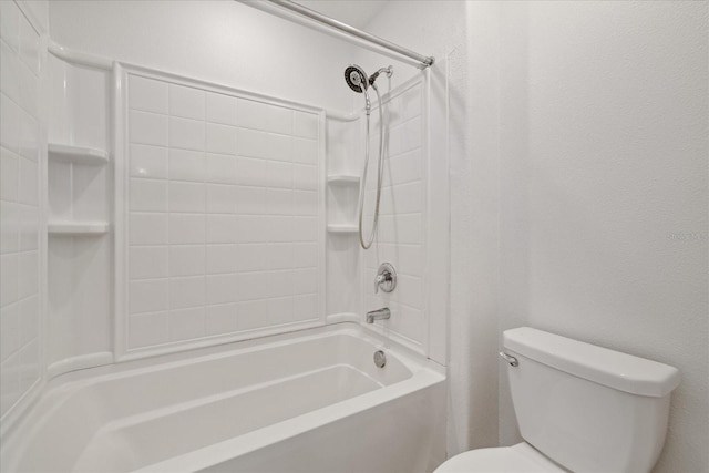 bathroom featuring toilet and bathtub / shower combination