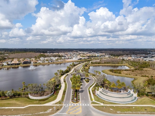 drone / aerial view with a water view