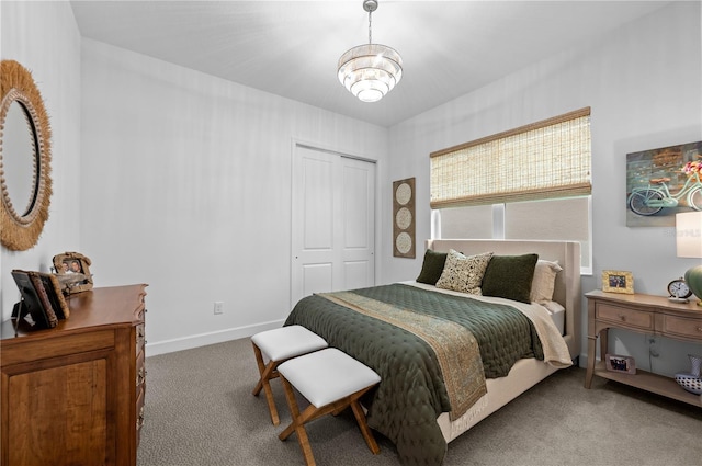 bedroom with carpet flooring and a closet