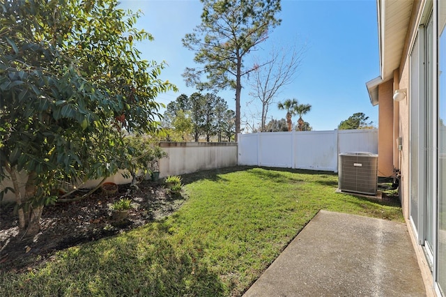 view of yard featuring central AC