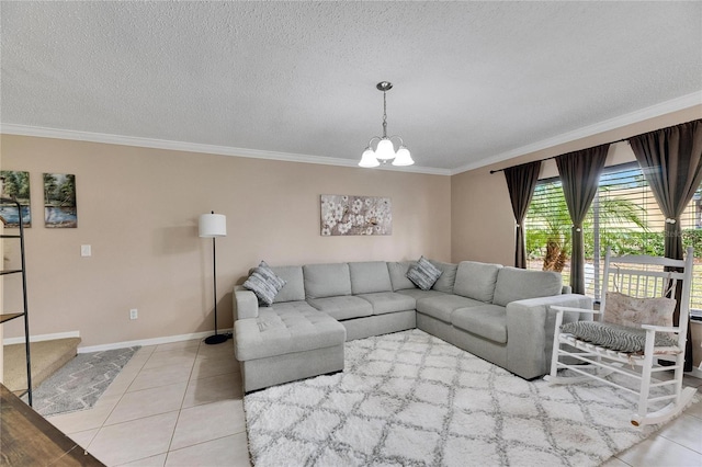 living room featuring a textured ceiling, a notable chandelier, light tile patterned floors, and ornamental molding