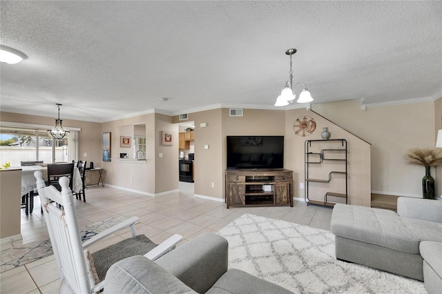 living room with crown molding, light tile patterned floors, a textured ceiling, and an inviting chandelier