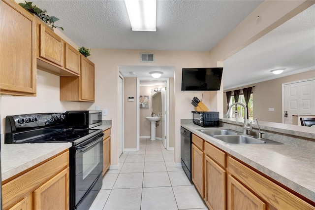 kitchen with black appliances, sink, light tile patterned floors, a textured ceiling, and light brown cabinetry