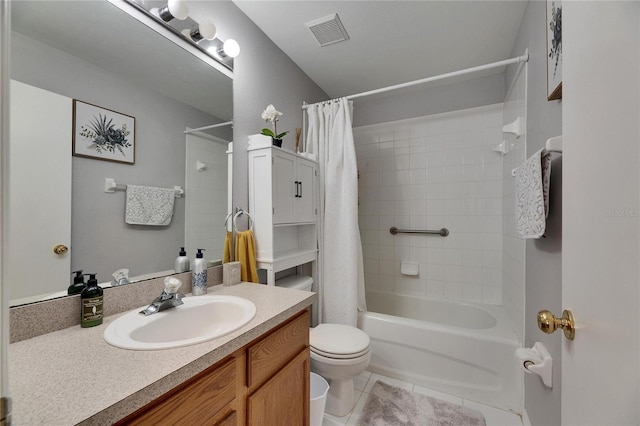 full bathroom with tile patterned flooring, shower / bath combo, vanity, and toilet