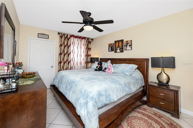 bedroom featuring ceiling fan and light tile patterned floors