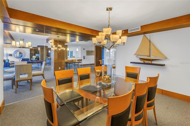 carpeted dining space with an inviting chandelier