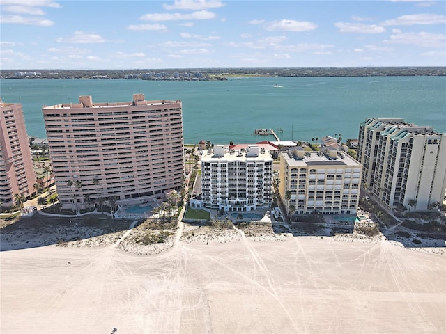 aerial view featuring a view of city and a water view