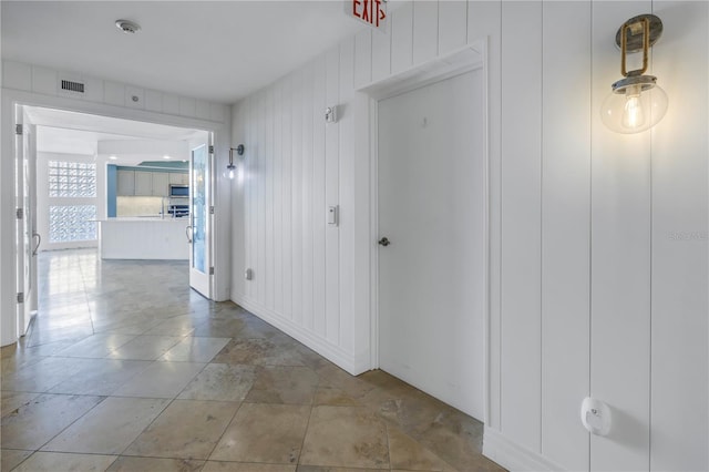 hall featuring visible vents