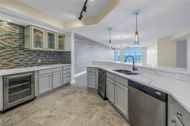 kitchen featuring gray cabinetry, wine cooler, dishwasher, and a sink