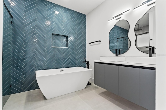 bathroom with vanity, tile patterned floors, tile walls, and independent shower and bath