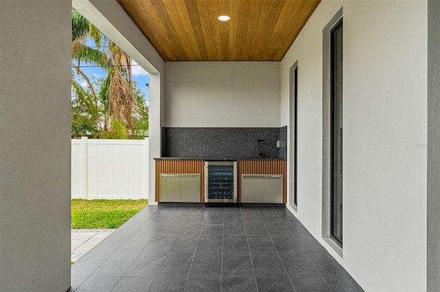 view of patio with wine cooler