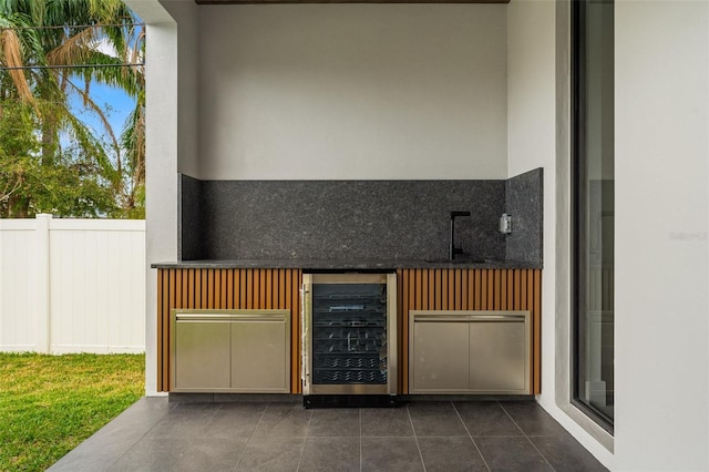 view of patio with beverage cooler