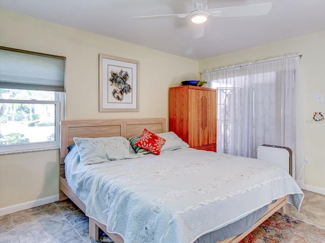 bedroom featuring ceiling fan