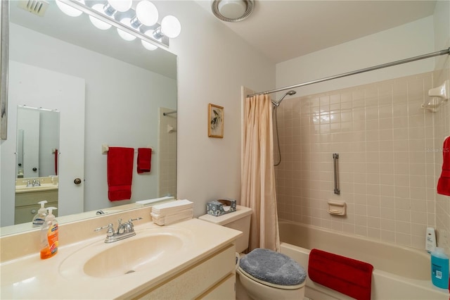 full bathroom featuring toilet, vanity, and shower / bathtub combination with curtain