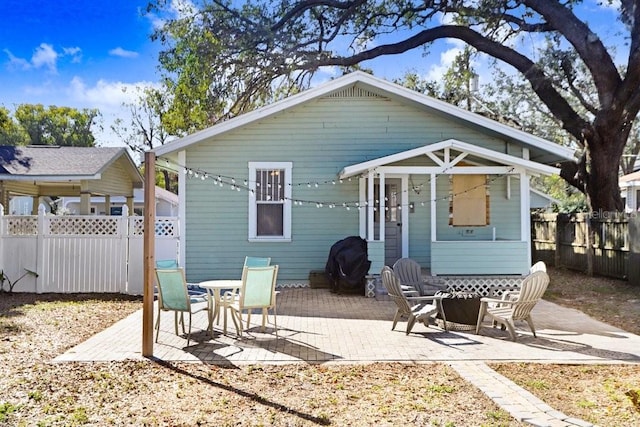 rear view of property with a patio