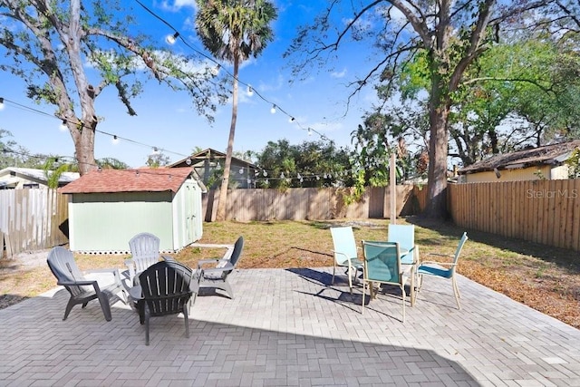 view of patio featuring a storage shed