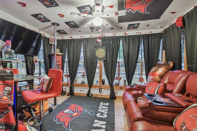 playroom featuring tile patterned floors and ceiling fan