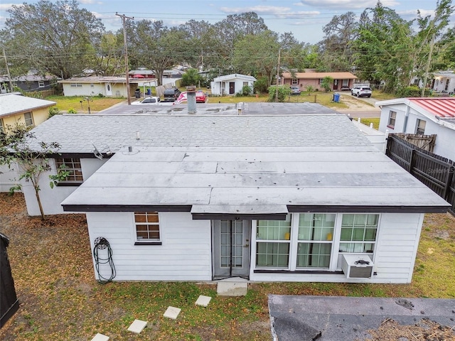 view of front of house with cooling unit