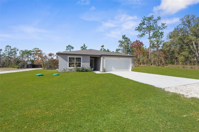 view of front of property featuring a front lawn and a garage