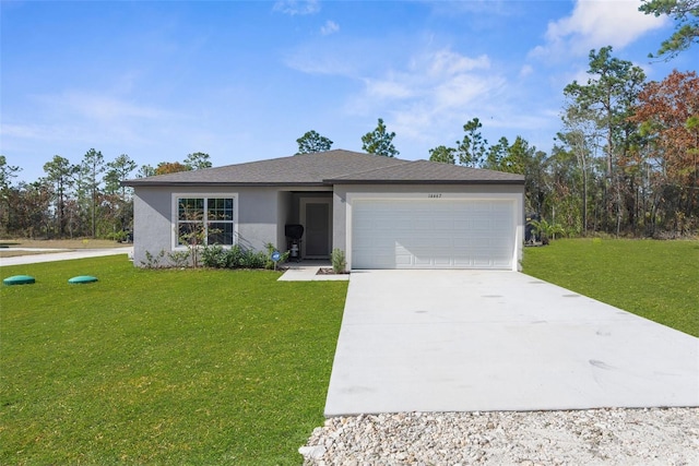 ranch-style home featuring a front lawn and a garage