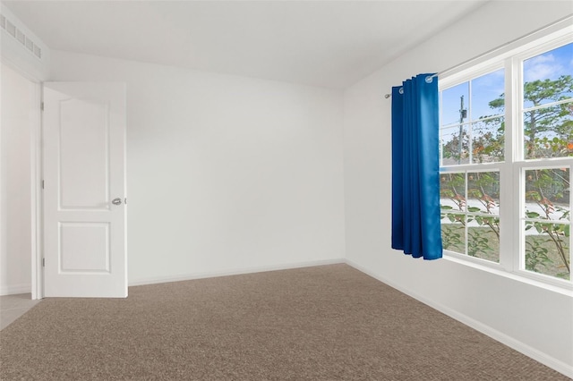 view of carpeted spare room