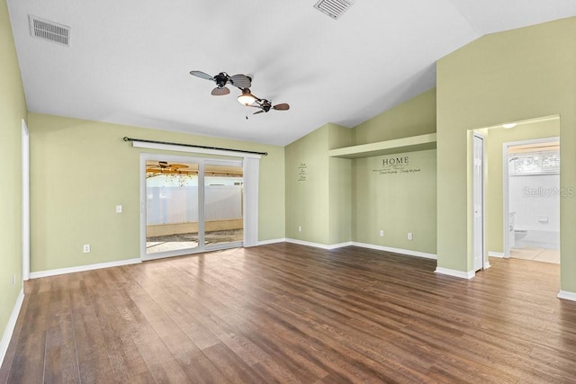 interior space featuring ensuite bath, ceiling fan, lofted ceiling, access to outside, and hardwood / wood-style flooring