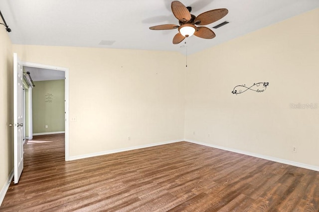 spare room with ceiling fan, wood-type flooring, and lofted ceiling