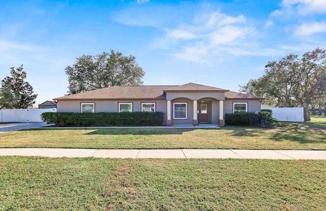 view of front facade with a front lawn